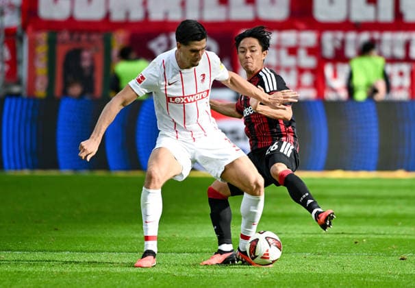 19.09.2026, xpsx, Fussball 1.Bundesliga, Eintracht Frankfurt - SC Freiburg v.l. Igor Matanovic (SC Freiburg), Keita Kosugi (Eintracht Frankfurt) (DFL DFB REGULATIONS PROHIBIT ANY USE OF PHOTOGRAPHS as IMAGE SEQUENCES and or QUASI-VIDEO) emspor Frankfurt