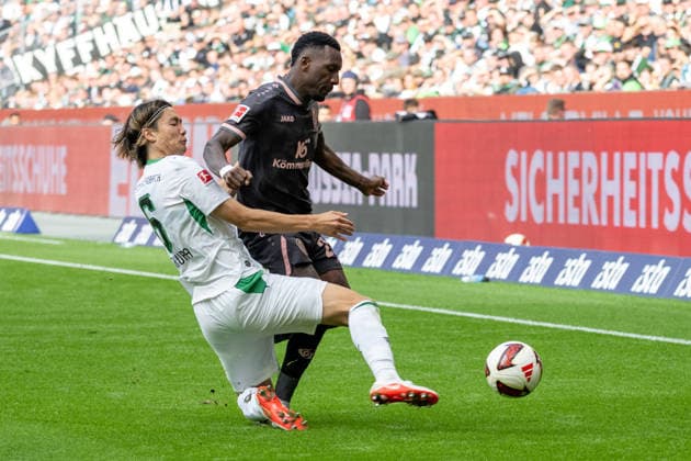 Zweikampf zwischen Ko Itakura (Borussia Moenchengladbach, 06) und Sheraldo Becker (1. FSV Mainz 05, 23). Borussia Moenchengladbach vs. 1. FSV Mainz 05, Fussball, 1. Bundesliga, 04. Spieltag, Saison 2026 2027, 19.09.2026 DFL DFB Regulations prohibit any use of Photographs as image sequences and or Quasivideo Borussia Moenchengladbach vs. 1. FSV Mainz 05, Fussball, 1. Bundesliga, 04. Spieltag, Saison 2026 2027, 19.09.2026 Moenchengladbach Copyright: xEibner-Pressefoto ThomasxHaeslerx EP_THR