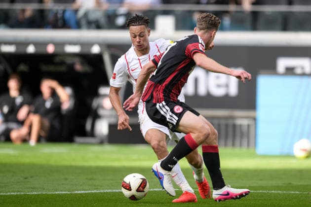 Fußball, 1. Bundesliga, 20260919, SG Eintracht Frankfurt - SC Freiburg. Im Bild, v.l. Derry SCHERHANT (Freiburg, 7) und Elias BAUM (Frankfurt, 2). Frankfurt Deutsche Bank Park Hessen Deutschland Copyright: Passion2Press MarkusxFischerx