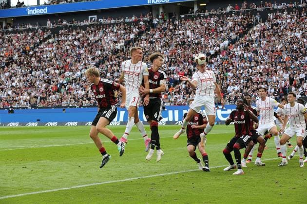 19.09.2026 xmgoodx Frankfurt am Main, Deutsche Bank Park Bundesliga Saison 2026 2027 Eintracht Frankfurt - SC Freiburg Jonathan Burkhardt (9, Eintracht Frankfurt) und Robin Koch (4, Eintracht Frankfurt) gegen Philipp Lienhart und Yannik Engelhardt (Freiburg) DFL DFB REGULATIONS PROHIBIT ANY USE OF PHOTOGRAPHS AS IMAGE SEQUENCES AND OR QUASI-VIDEO.