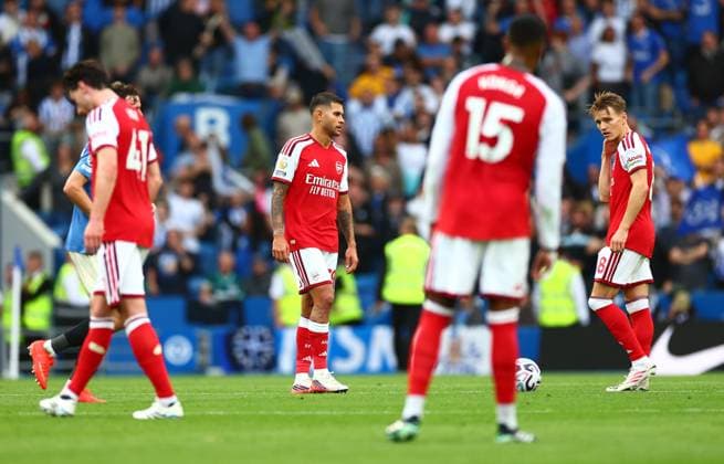 Bruno Guimaraes of Arsenal and team mates look dejected. Brighton & Hove Albion v Arsenal, Premier League, Football, American Express Stadium, Brighton, UK - 19 Sep 2026Brighton American Express Stadium United Kingdom EDITORIAL USE ONLY No use with unauthorised audio, video, data, fixture lists, club league logos or live services. Online in-match use limited to 120 images, no video emulation. No use in betting, games or single club league player publications. Copyright: xJamesxMarsh Shutterstockx 17158687bb