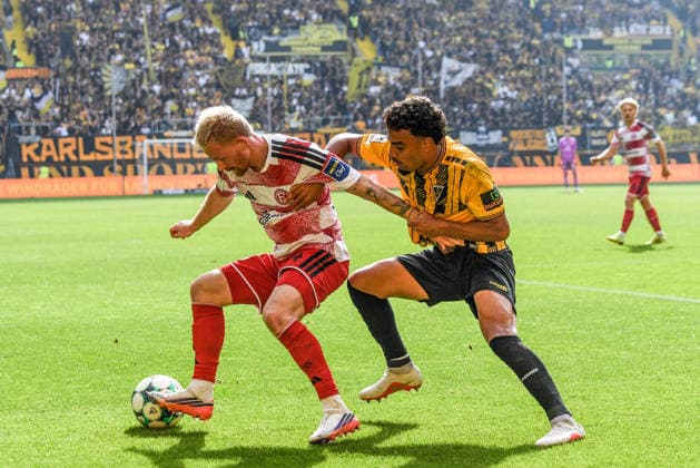 v.li.: Jomaine Consbruch (Fortuna Düsseldorf, 14), Mehdi Loune (Alemannia Aachen, 10), Zweikampf, Duell, duel, tackle, tackling, Dynamik, Action, Aktion, 19.09.2026, Aachen (Deutschland), Fussball, 3. Liga, TSV Alemannia Aachen - Fortuna Düsseldorf, Fussball, 3. Liga, TSV Alemannia Aachen - Fortuna Düsseldorf, DFB DFL REGULATIONS PROHIBIT ANY USE OF PHOTOGRAPHS AS IMAGE SEQUENCES AND OR QUASI-VIDEO.