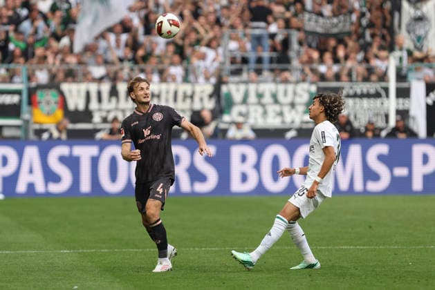 Stefan Posch (1.FSV Mainz 05) und Wael Mohya (Borussia Moenchengladbach) im Zweikampf waehrend des Spiels der 1. Bundesliga zwischen Borussia Moenchengladbach und 1. FSV Mainz 05, ista-Borussia-Park am 19. September 2026 in Moenchengladbach, Deutschland. (Foto von Oliver Kaelke DeFodi Images) +++ Stefan Posch (1.FSV Mainz 05) und Wael Mohya (Borussia Moenchengladbach) battle for the ball during the Bundesliga match between Borussia Moenchengladbach and 1. FSV Mainz 05 at ista-Borussia-Park on September 19, 2026 in Moenchengladbach, Germany. (Photo by Oliver Kaelke DeFodi Images) DFB DFL REGULATIONS PROHIBIT ANY USE OF PHOTOGRAPHS AS IMAGE SEQUENCES AND OR QUASI-VIDEO. (Photo by Oliver Kaelke DeFodi Images) -