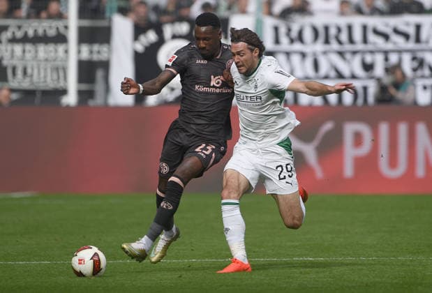 19.09.2026, xhbx, Fussball 1.Bundesliga, Borussia Moenchengladbach - 1.FSV Mainz 05 v.l. Sheraldo Becker (FSV Mainz 05), Joe Scally (Borussia Mönchengladbach) (DFL DFB REGULATIONS PROHIBIT ANY USE OF PHOTOGRAPHS as IMAGE SEQUENCES and or QUASI-VIDEO) Moenchengladbach