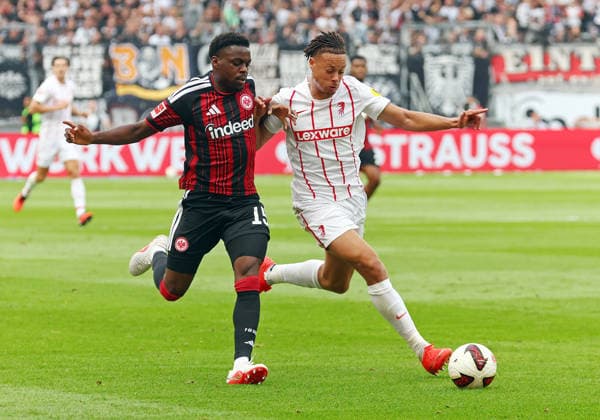 19.09.2026, xovx, Fußball Fußball Bundesliga, Eintracht Frankfurt - SC Freiburg v.l. Noel Aseko (Eintracht Frankfurt), Derry Scherhant (SC Freiburg) (DFL DFB REGULATIONS PROHIBIT ANY USE OF PHOTOGRAPHS as IMAGE SEQUENCES and or QUASI-VIDEO) emspor Frankfurt