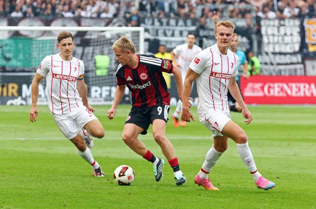 19.09.2026, xovx, Fußball Fußball Bundesliga, Eintracht Frankfurt - SC Freiburg v.l. Maximilian Eggestein (SC Freiburg), Jonathan Burkardt (Eintracht Frankfurt), Philipp Lienhart (SC Freiburg) (DFL DFB REGULATIONS PROHIBIT ANY USE OF PHOTOGRAPHS as IMAGE SEQUENCES and or QUASI-VIDEO) emspor Frankfurt