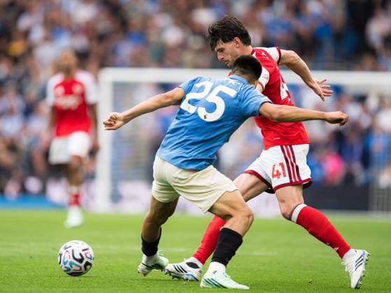 Declan Rice of Arsenal takes on Diego Gomez of Brighton and Hove Albion Brighton and Hove Albion v Arsenal, Premier League, Football, American Express Stadium, Brighton, UK - 19 Sep 2026Brighton American Express Stadium United Kingdom EDITORIAL USE ONLY No use with unauthorised audio, video, data, fixture lists, club league logos or live services. Online in-match use limited to 120 images, no video emulation. No use in betting, games or single club league player publications. Copyright: xWiredxPhotos Shutterstockx 17158693ek