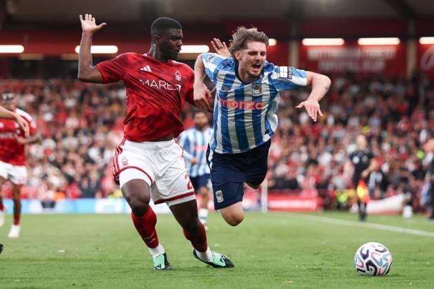 Ousmane Diomandà of Nottingham Forest fouls Jack Rudoni of Coventry City. Nottingham Forest v Coventry City, Premier League, Football, The City Ground, Nottingham, UK - 19 Sep 2026Nottingham The City Ground United Kingdom EDITORIAL USE ONLY No use with unauthorised audio, video, data, fixture lists, club league logos or live services. Online in-match use limited to 120 images, no video emulation. No use in betting, games or single club league player publications. Copyright: xRyanxBrowne Shutterstockx 17158587gd