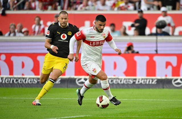 Zweikampf, Aktion Deniz Undav VfB Stuttgart (26) gegen Waldemar Anton Borussia Dortmund BVB (03) VfB Stuttgart vs Borussia Dortmund BVB 19.09.2026 DFL REGULATIONS PROHIBIT ANY USE OF PHOTOGRAPHS AS IMAGE SEQUENCES AND OR QUASI-VIDEO VfB Stuttgart vs Borussia Dortmund BVB
