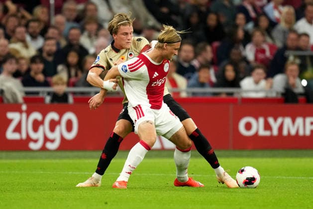Eredivisie: AFC Ajax v Excelsior Rotterdam Amsterdam - Casper Widell of Excelsior Rotterdam duels for the ball with Kasper Dolberg of AFC Ajax Amsterdam during the seventh competition round of the 2026 2027 Eredivisie season. The match is set between AFC Ajax and Excelsior Rotterdam at Johan Cruijff ArenA on 19 September 2026 in Amsterdam, Netherlands. (Hero Images Yannick Verhoeven) Copyright: xYannickxVerhoevenx