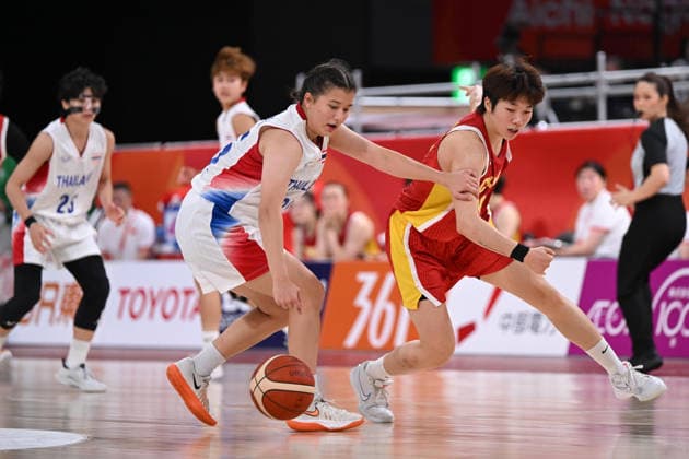 Thailand v China - Asian Games Aichi-Nagoya NAGOYA, JAPAN - SEPTEMBER 19: Yujie Chen (12) of China competes with TUUKKANEN Sarah 35 of Thailand during the basketball Women s Group A between Thailand and China on day zero of the 20th Asian Games Aichi-Nagoya at Aichi International Arena on September 19, 2026 in Nagoya, Aichi, Japan. Stringer Anadolu Nagoya Japan. Editorial use only. Please get in touch for any other usage.  Copyright: x2026xAnadoluxStringerx
