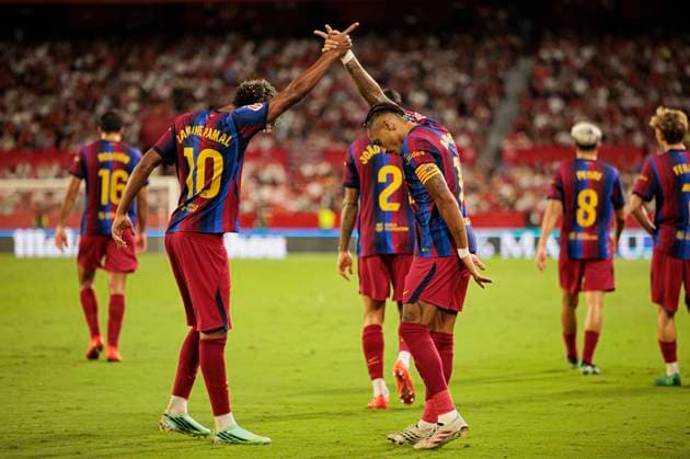 September 19, 2026, Seville, Spain: Lamine Yamal and Raphinha FC Barcelona, Barca seen in action celebrating after scoring goal during LaLiga EA SPORTS 2026 2027 game between teams of Sevilla FC and FC Barcelona..Final Score: Sevilla FC 1-3 FC Barcelona. Seville Spain - ZUMAs197 20260919_aaa_s197_313 Copyright: xMaciejxRogowskix