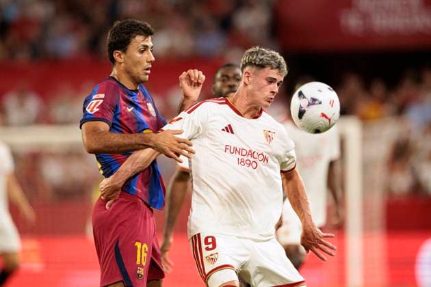 September 19, 2026, Seville, Spain: Rodri FC Barcelona, Barca and Robbie Ure (Sevilla FC) seen in action during LaLiga EA SPORTS 2026 2027 game between teams of Sevilla FC and FC Barcelona. Seville Spain - ZUMAs197 20260919_aaa_s197_297 Copyright: xMaciejxRogowskix