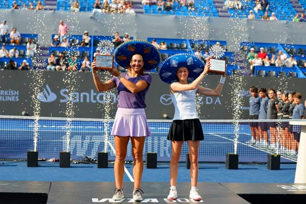 Guadalajara Open tennis tournament Cristina Bucsa (R) of Spain and Nicole Melichar-Martinez (L) of the USA celebrate pose with their trophies after defeating Momoko Kobori of Japan and Peangtarn Plipuech of Thailand during the doubles final of the Guadalajara Open tennis tournament in Guadalajara, Mexico, 19 September 2026. Guadalajara Mexico  Copyright: xFranciscoxGuascox