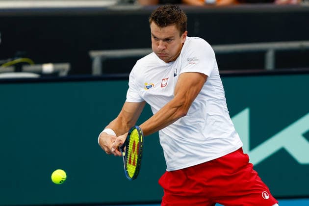 TENNIS DAVIS CUP AUSTRALIA POLAND, Karol Drzewiecki of Poland plays a backhand during a Doubles match against Max Purcell and Rinky Hijikata of Australia during the Davis Cup match between Australia and Poland at Pat Rafter Arena in Brisbane, Sunday, September 20, 2026. ( NO ARCHIVING, EDITORIAL USE ONLY  Copyright: xRUSSELLxFREEMANx 20260920121819617845