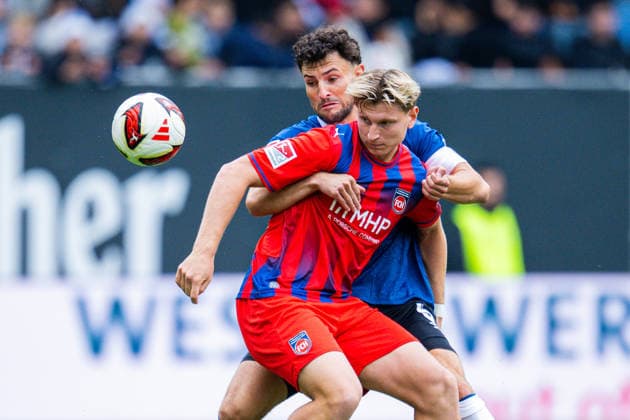 20.09.2026 - Fußball, 2026 2027, 2. Bundesliga, 6. Spieltag, DSC Arminia Bielefeld - 1. FC Heidenheim: (L-R) Maximilian Bauer (Bielefeld), Alessandro Vogt (Heidenheim) DFL REGULATIONS PROHIBIT ANY USE OF PHOTOGRAPHS AS IMAGE SEQUENCES AND OR QUASI-VIDEO.