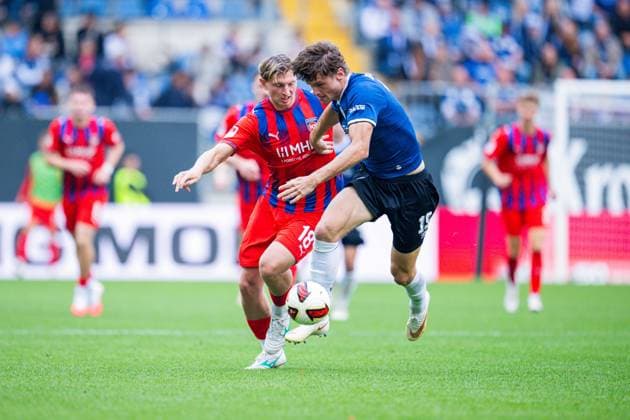 20.09.2026 - Fußball, 2026 2027, 2. Bundesliga, 6. Spieltag, DSC Arminia Bielefeld - 1. FC Heidenheim: (L-R) Alessandro Vogt (Heidenheim), Maximilian Großer (Bielefeld) DFL REGULATIONS PROHIBIT ANY USE OF PHOTOGRAPHS AS IMAGE SEQUENCES AND OR QUASI-VIDEO.
