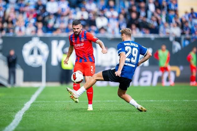 20.09.2026 - Fußball, 2026 2027, 2. Bundesliga, 6. Spieltag, DSC Arminia Bielefeld - 1. FC Heidenheim: (L-R) Marnon Busch (Heidenheim), Tim Handwerker (Bielefeld) DFL REGULATIONS PROHIBIT ANY USE OF PHOTOGRAPHS AS IMAGE SEQUENCES AND OR QUASI-VIDEO.