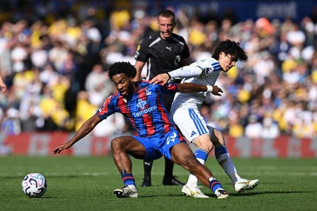 Quinten Timber of Crystal Palace and Ao Tanaka of Leeds United Leeds United v Crystal Palace, Premier League, Football, Elland Road, Leeds, UK - 20 Sep 2026Leeds Elland Road United Kingdom EDITORIAL USE ONLY No use with unauthorised audio, video, data, fixture lists, club league logos or live services. Online in-match use limited to 120 images, no video emulation. No use in betting, games or single club league player publications. Copyright: xGreigxCowie Shutterstockx 17159996ag