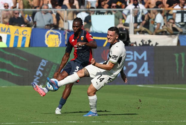 Parma™s Emanuele Valeri fights for the ball with Genoa™s Kingsley Osezele Ehizibue during the Serie A soccer match between Parma and Genoa at the Ennio Tardini Stadium in Parma, north west Italy - September 20, 2026. - Soccer  Copyright: xGiannixSantandrea LaPressex