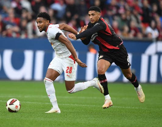 20.09.2026, xophax, Fussball 1.Bundesliga, Bayer 04 Leverkusen - RB Leipzig Christopher Nkunku ( RB Leipzig ) , links und Jarell Quansah ( Bayer 04 ) (DFL DFB REGULATIONS PROHIBIT ANY USE OF PHOTOGRAPHS as IMAGE SEQUENCES and or QUASI-VIDEO) Leverkusen