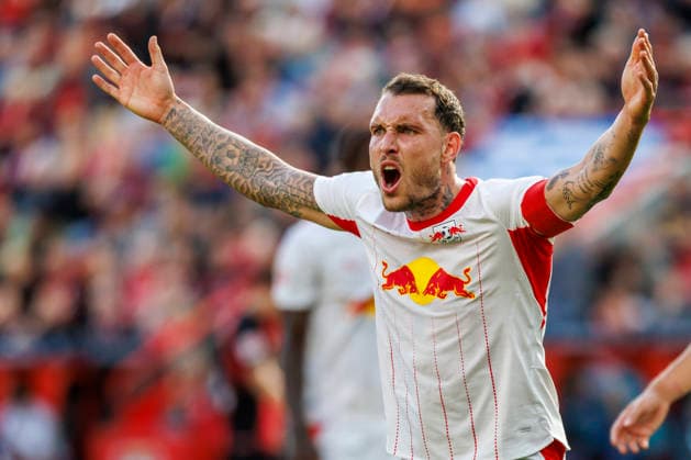 LEVERKUSEN, GERMANY - SEPTEMBER 20, 2026: David Raum (RB Leipzig, 22) gestures during the German Bundesliga match on gameday 4 between Bayer 04 Leverkusen vs. RB Leipzig at BayArena on September 20, 2026 in Leverkusen, Germany. DFL REGULATIONS PROHIBIT ANY USE OF PHOTOGRAPHS AS IMAGE SEQUENCES AND OR QUASI-VIDEO. Northrhine-Westphalia Germany Copyright: xAxelxKohringx