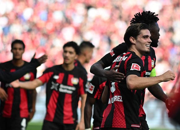 20.09.2026, xophax, Fussball 1.Bundesliga, Bayer 04 Leverkusen - RB Leipzig Miguel Ortega Gutierrez , rechts mit Edmond Tapsoba ( beide Bayer 04 ) nach seinem Tor zum 2 zu 0 (DFL DFB REGULATIONS PROHIBIT ANY USE OF PHOTOGRAPHS as IMAGE SEQUENCES and or QUASI-VIDEO) Leverkusen