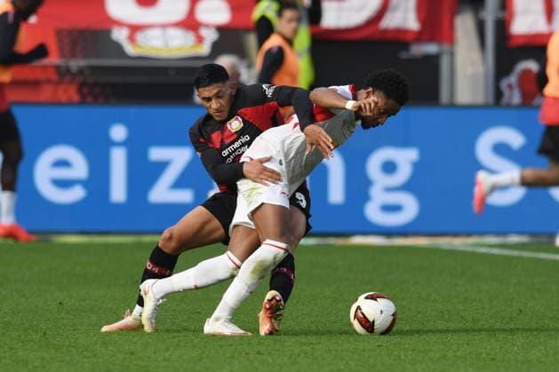 Ezequiel Fernandez ( Bayer 04 Leverkusen, 06 ) im Zweikampf mit Christopher Nkunku ( RB Leipzig, 28 ). GER, Bayer 04 Leverkusen vs RB Leipzig, Fussball, Bundesliga, 4. Spieltag, Spielzeit 2026 2027, 20.09.2026 DFL REGULATIONS PROHIBIT ANY USE OF PHOTOGRAPHS AS IMAGE SEQUENCES AND OR QUASI-VIDEO GER, Bayer 04 Leverkusen vs RB Leipzig, Fussball, Bundesliga, 4. Spieltag, Spielzeit 2026 2027, 20.09.2026 Leverkusen Copyright: xEibner-Pressefoto ThomasxThienelx EP_TTL