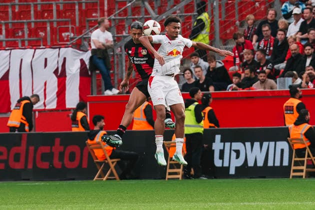20.09.2026, xjmrgnx, Fussball 1.Bundesliga, Bayer 04 Leverkusen - RB Leipzig v.l. Kopfballduell zwischen Facundo Medina (2, Leverkusen) und Tidiam Gomis (27, Leipzig) (DFL DFB REGULATIONS PROHIBIT ANY USE OF PHOTOGRAPHS as IMAGE SEQUENCES and or QUASI-VIDEO) Leverkusen