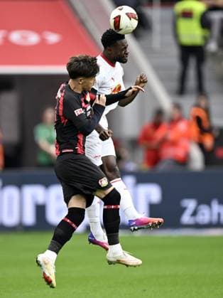 LEVERKUSEN - (lr) Alfonso Moreira of Bayer 04 Leverkusen, Ridle Baku or RB Leipzig during the match between Bayer 04 Leverkusen and RB Leipzig at the Bay Arena on 20 September 2026 in Leverkusen, Germany. ANP Bundesliga 2026 27 xVIxANPxSportx xGerritxvanxKeulenxIVx 569419468 originalFilename: 569419468.jpg