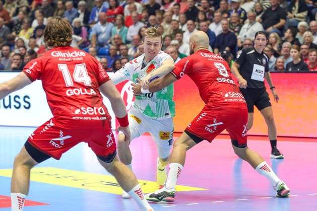 20.09.2026, xgox, Handball - Opel HBL MT Melsungen - SC Magdeburg emspor, v.l. Gisli Thorgeir Kristjansson (Magdeburg, 10), Adrian Sipos (Melsungen, 8) Zweikampf, Duell, Kampf, tackle Kassel