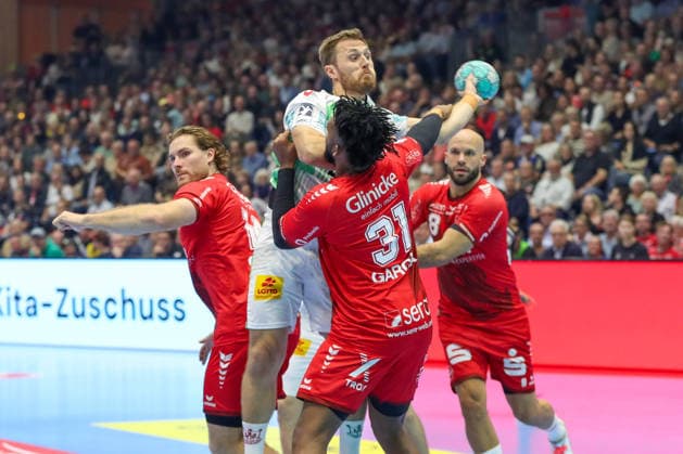 20.09.2026, xgox, Handball - Opel HBL MT Melsungen - SC Magdeburg emspor, v.l. Dariel Garcia Rivera (Melsungen, 31), Albin Lagergren (Magdeburg, 21) Zweikampf, Duell, Kampf, tackle Kassel