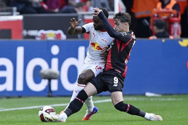 LEVERKUSEN - (lr) Ridle Baku or RB Leipzig, Alfonso Moreira or Bayer 04 Leverkusen during the match between Bayer 04 Leverkusen and RB Leipzig at the Bay Arena on 20 September 2026 in Leverkusen, Germany. ANP Bundesliga 2026 27 xVIxANPxSportx xGerritxvanxKeulenxIVx 569419518 originalFilename: 569419518.jpg