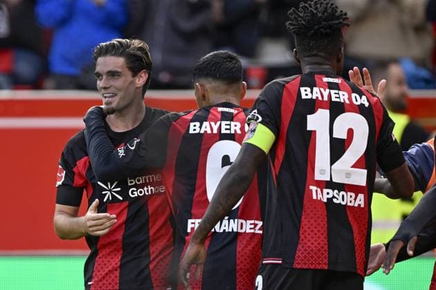 LEVERKUSEN - Bayer 04 Leverkusen celebrates the goal of Miquel Gutierrez of Bayer 04 Leverkusen (l) during the match between Bayer 04 Leverkusen and RB Leipzig at the Bay Arena on 20 September 2026 in Leverkusen, Germany. ANP Bundesliga 2026 27 xVIxANPxSportx xGerritxvanxKeulenxIVx 569419612 originalFilename: 569419612.jpg