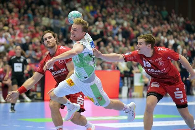 Gisli Thorgeir Kristjansson (SC Magdeburg 10) beim Wurf; Johannes Golla (MT Melsungen 14) (L), Reynir Thor Stefansson (MT Melsungen 19) , GER, MT Melsungen - SC Magdeburg, Handball, 1. Bundesliga, 5. Spieltag, Saison 2026 2027, 20.09.2026, GER, MT Melsungen - SC Magdeburg, Handball, 1. Bundesliga, 5. Spieltag, Saison 2026 2027, 20.09.2026 Kassel Copyright: xEibner-Pressefotox xRolandxSippelx EP_RSL