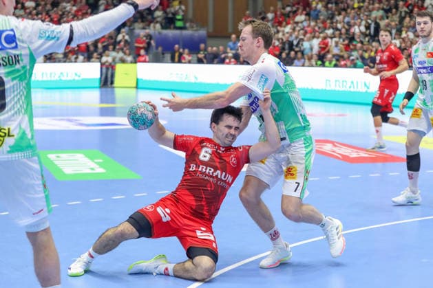 20.09.2026, xgox, Handball - Opel HBL MT Melsungen - SC Magdeburg emspor, v.l. Erik Balenciaga (Melsungen, 6), Felix Claar (Magdeburg, 7) Zweikampf, Duell, Kampf, tackle Kassel