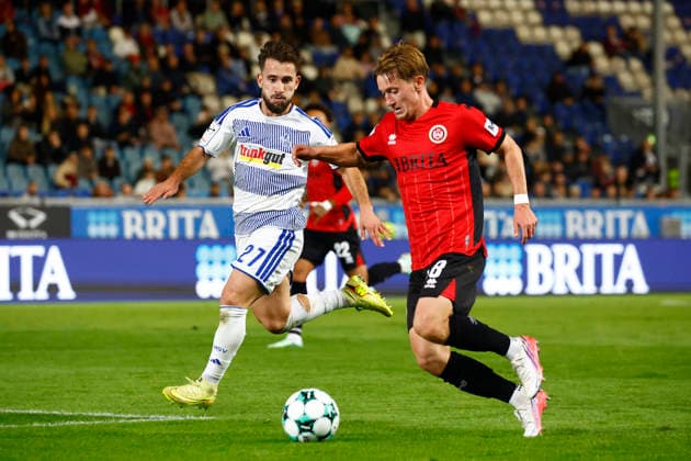 20.09.2026, xavx, Fussball 3.Liga, SV Wehen Wiesbaden - MSV Duisburg v.l. Can Coskun (MSV Duisburg), Fabian Greilinger (SV Wehen Wiesbaden) Wiesbaden