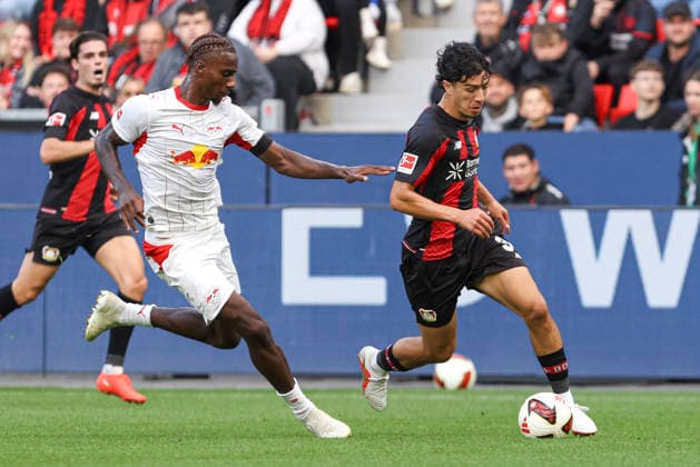 Ezechiel Banzuzi (RB Leipzig) und Ibrahim Maza (Bayer 04 Leverkusen) im Zweikampf waehrend des Spiels der 1. Bundesliga zwischen Bayer 04 Leverkusen und RB Leipzig, BayArena am 20. September 2026 in Leverkusen, Deutschland. (Foto von Oliver Kaelke DeFodi Images) +++ Ezechiel Banzuzi (RB Leipzig) und Ibrahim Maza (Bayer 04 Leverkusen) battle for the ball during the Bundesliga match between Bayer 04 Leverkusen and RB Leipzig at BayArena on September 20, 2026 in Leverkusen, Germany. (Photo by Oliver Kaelke DeFodi Images) DFB DFL REGULATIONS PROHIBIT ANY USE OF PHOTOGRAPHS AS IMAGE SEQUENCES AND OR QUASI-VIDEO. (Photo by Oliver Kaelke DeFodi Images) -