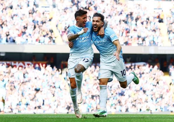 Rayan Cherki of Manchester City celebrates scoring a goal to make it 2-1 with Enzo Fernandez Manchester City v Sunderland, Premier League, Football, Etihad Stadium, Manchester, UK - 20 Sep 2026Manchester Etihad Stadium United Kingdom EDITORIAL USE ONLY No use with unauthorised audio, video, data, fixture lists, club league logos or live services. Online in-match use limited to 120 images, no video emulation. No use in betting, games or single club league player publications. Copyright: xMattxWest Shutterstockx 17160119dn