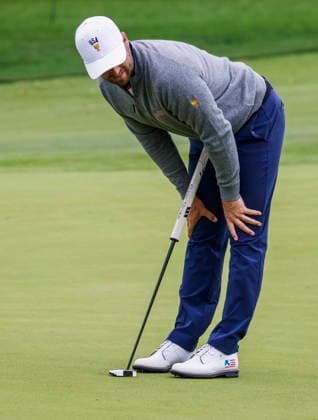 Wyndham Clark of the US reacts to a putt on the fourteenth green during practice for the Presidents Cup golf tournament at Medinah Country Club in Medinah, Illinois on Monday, September 21, 2026. Competition between the USA and the International team begins on Thursday, September 24 with Four-Ball play.  MED20260922808 TANNENxMAURY