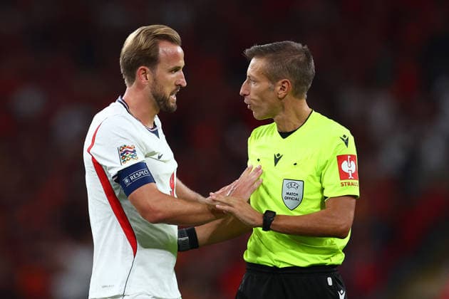 London, England, 26th September 2026. Harry Kane of England talks with referee Davide Massa during the England vs Spain UEFA Nations League match at Wembley Stadium, London. Picture credit should read: Paul Terry Sportimage EDITORIAL USE ONLY. No use with unauthorised audio, video, data, fixture lists, club league logos or live services. Online in-match use limited to 120 images, no video emulation. No use in betting, games or single club league player publications. SPI_153_PT_England_Spain SPI-5020-0152