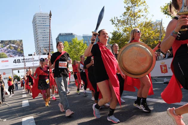 September 27, 2026, Warsaw, Masovian Voivodeship, Poland: Runners of the Spartans for Children Foundation cross the finish line of the Nice To Fit You Warsaw 10k Run as part of the 48th Warsaw Marathon. The race has been awarded the World Athletics Elite Label for the first time in its history and is part of the European Marathon Classics (EMC) series of races. Warsaw Marathon 2026  - ZUMAk204 20260927_zip_k204_031 Copyright: xRomanxKozielx