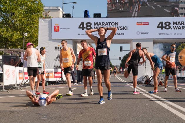 September 27, 2026, Warsaw, Masovian Voivodeship, Poland: Runners after crossing the finish line of the 48th Warsaw Marathon. The race has been awarded the World Athletics Elite Label for the first time in its history and is part of the European Marathon Classics (EMC) series of races. Warsaw Marathon 2026  - ZUMAk204 20260927_zip_k204_032 Copyright: xRomanxKozielx