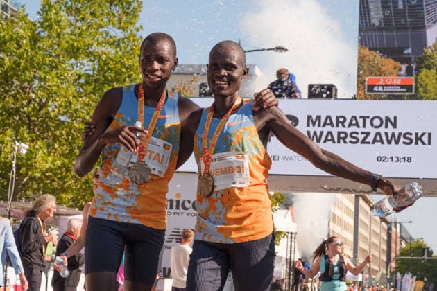September 27, 2026, Warsaw, Masovian Voivodeship, Poland: 2nd place VICTOR KWEMBOI and 3rd place EZEKIEL MUTAI (both of Uganda) celebrate at the finish line of the 48th Warsaw Marathon. The race has been awarded the World Athletics Elite Label for the first time in its history and is part of the European Marathon Classics (EMC) series of races. Warsaw Poland - ZUMAk204 20260927_zip_k204_026 Copyright: xRomanxKozielx