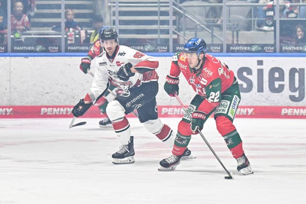 Penny DEL; Augsburger Panther - Kölner Haie, 27.09.2026 AUGSBURG, GERMANY; 27. SEPTEMBER: im Duell Louis-Marc AUBRY (Kölner Haie 15) und Noel HOEFENMAYER (Augsburger Panther 22) während dem Match der Penny DEL zwischen den Augsburger Panthern und den Kölner Haien am 4. Spieltag im Curt Frenzel Stadion Copyright: xBEAUTIFULxSPORTS Goldbergx
