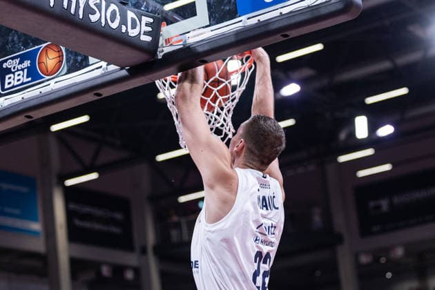easyCredit Basketball Bundesliga, Telekom Baskets Bonn vs. Syntainics MBC, 27.09.2026 Dunk von Borisa Simanic (SYNTAINICS MBC 22) - easyCredit Basketball Bundesliga, Telekom Baskets Bonn vs. Syntainics MBC, 27.09.2026, Telekom Dome Bonn Copyright: xBEAUTIFULxSPORTS Derixx