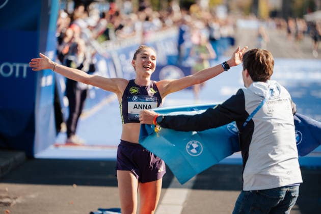 27.09.26, BMW Berlin Marathon 2026, Berlin Anna Langerwisch of Germany crosses the finish line as the first german runner in celebration at the BMW Berlin-Marathon in Berlin, Germany. Berlin Berlin BE Deutschland