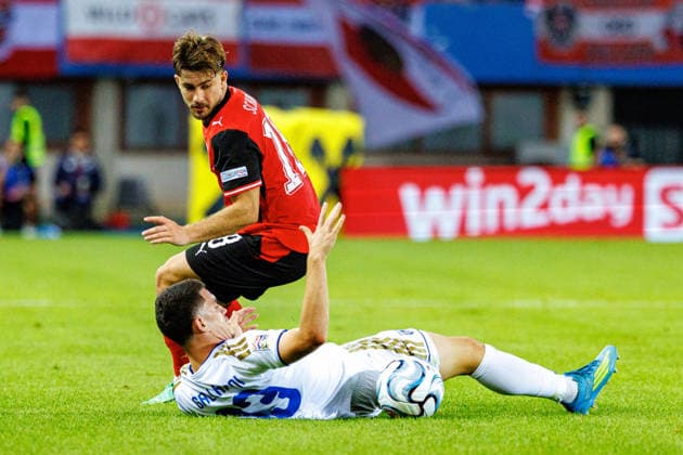 VIENNA, AUSTRIA - 27 SEPTEMBER 2026: Image shows Schmid Romano (Austria, 18) and Avdullahu Leon (Kosovo, 23) during UEFA Nations League 2026 27 League B, Group B3, Matchday 2: Austria vs Kosovo at Ernst-Happel-Stadion on 27 09 2026 in Vienna, Austria. Austria Copyright: xFröhlichxPascalx