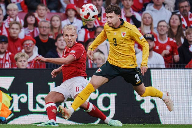 Nations League: Denmark - Wales Denmark s Gustav Isaksen and Wales Neco Williams during the Nations League match between Denmark and Wales at Parken, Sunday, September 27, 2026. (Photo: Liselotte Sabroe Ritzau Scanpix) , Copenhagen Denmark Copyright: Ritzau Scanpix LiselottexSabroex spdk20260927-203231-L