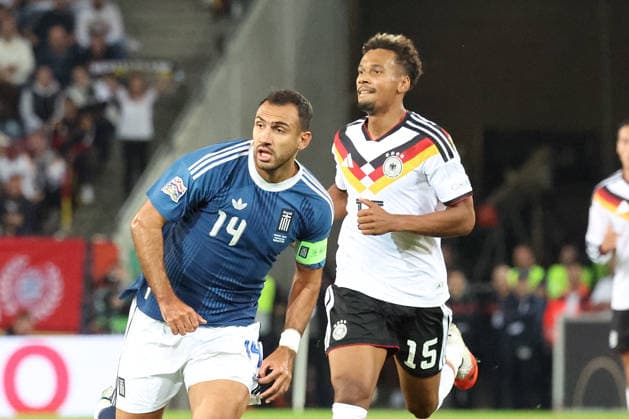 27.09.2026, xrekx, Fussball UEFA Nations League, Deutschland - Griechenland v.l. Vangelis Pavlidis (Griechenland) BambasÃ ContÃ (Deutschland) Augsburg